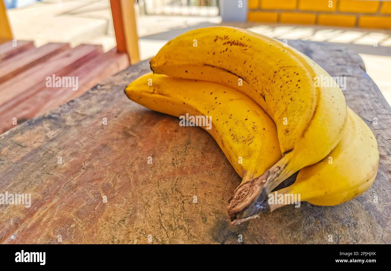 Bananas banana fruit fruits on wooden table in Zicatela Puerto