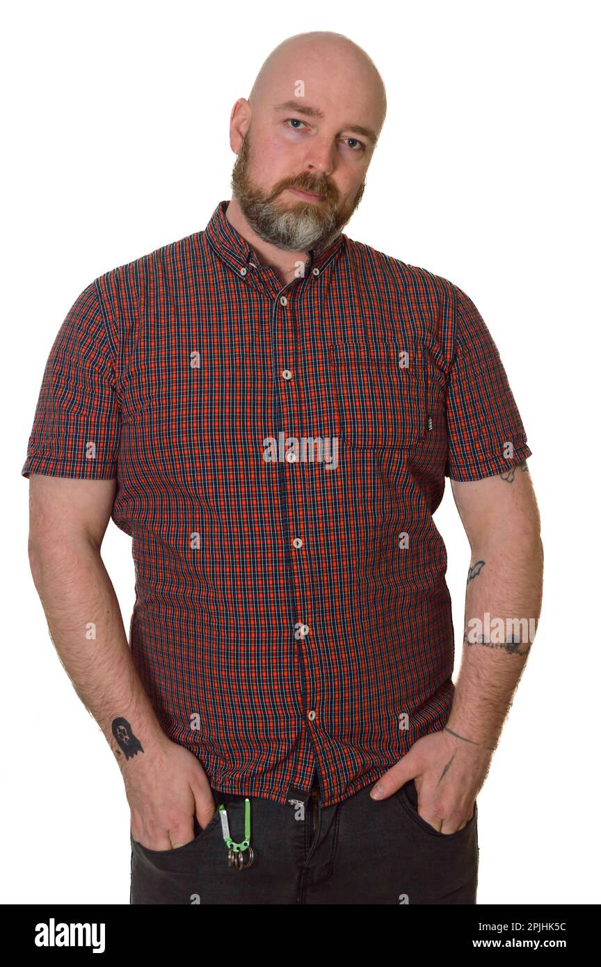 Tattooed Skinhead With Beard in Checked Shirt on White Background Stock Photo