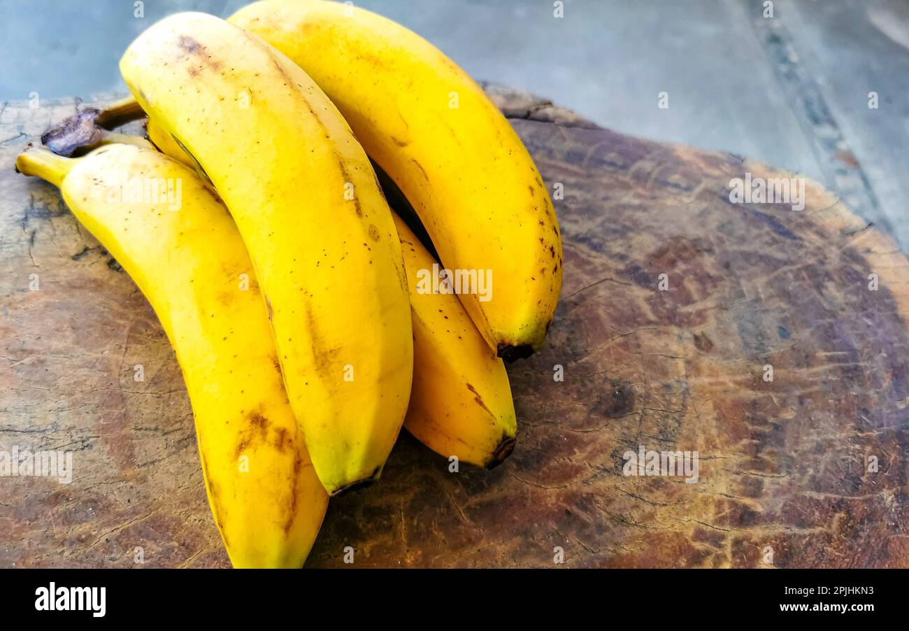 Bananas banana fruit fruits on wooden table in Zicatela Puerto