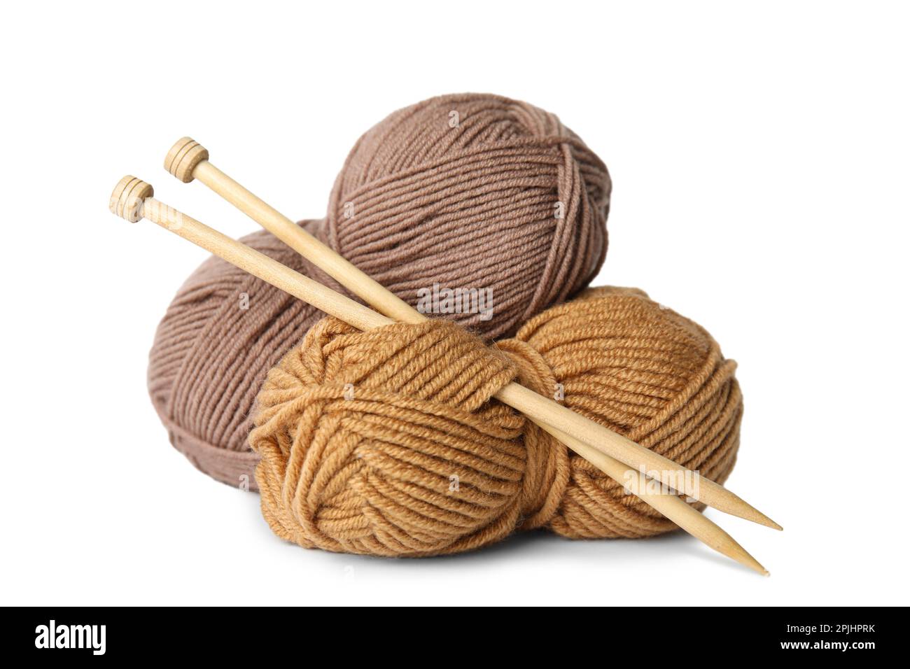 Soft woolen yarns and knitting needles on white background Stock Photo ...