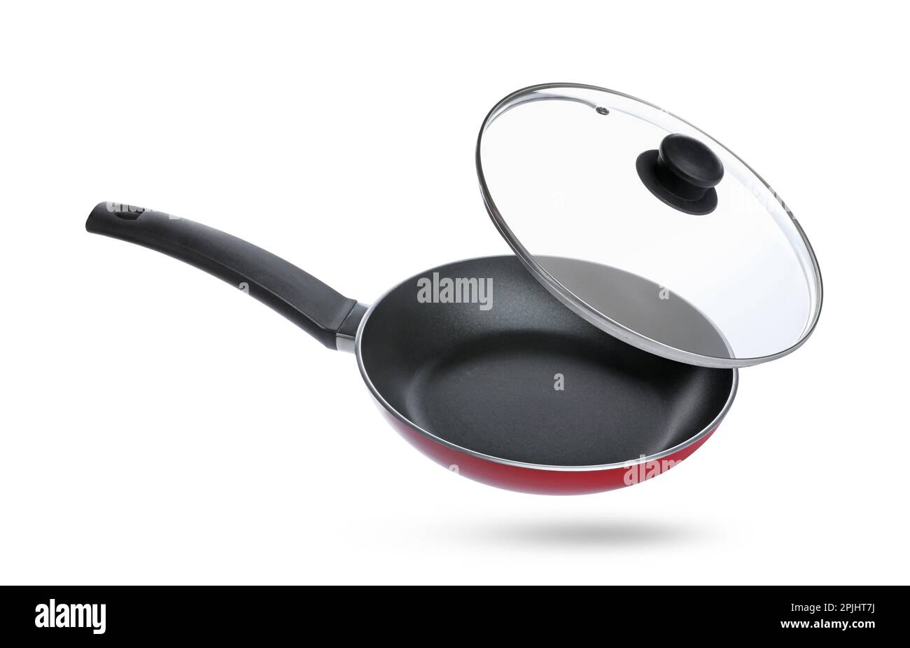 New frying pan and glass lid on white background Stock Photo Alamy