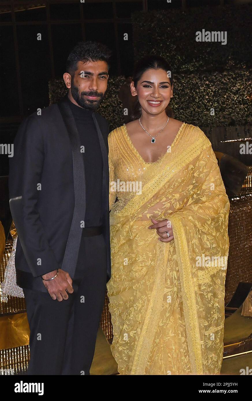 Mumbai, India. 31st Mar, 2023. Indian cricketer Jasprit Bumrah and his television presenter wife Sanjana Ganesan pose for a photo at the inauguration of Nita Mukesh Ambani Cultural Centre (NMACC) in Mumbai. (Photo by Ashish Vaishnav/SOPA Images/Sipa USA) Credit: Sipa USA/Alamy Live News Stock Photo