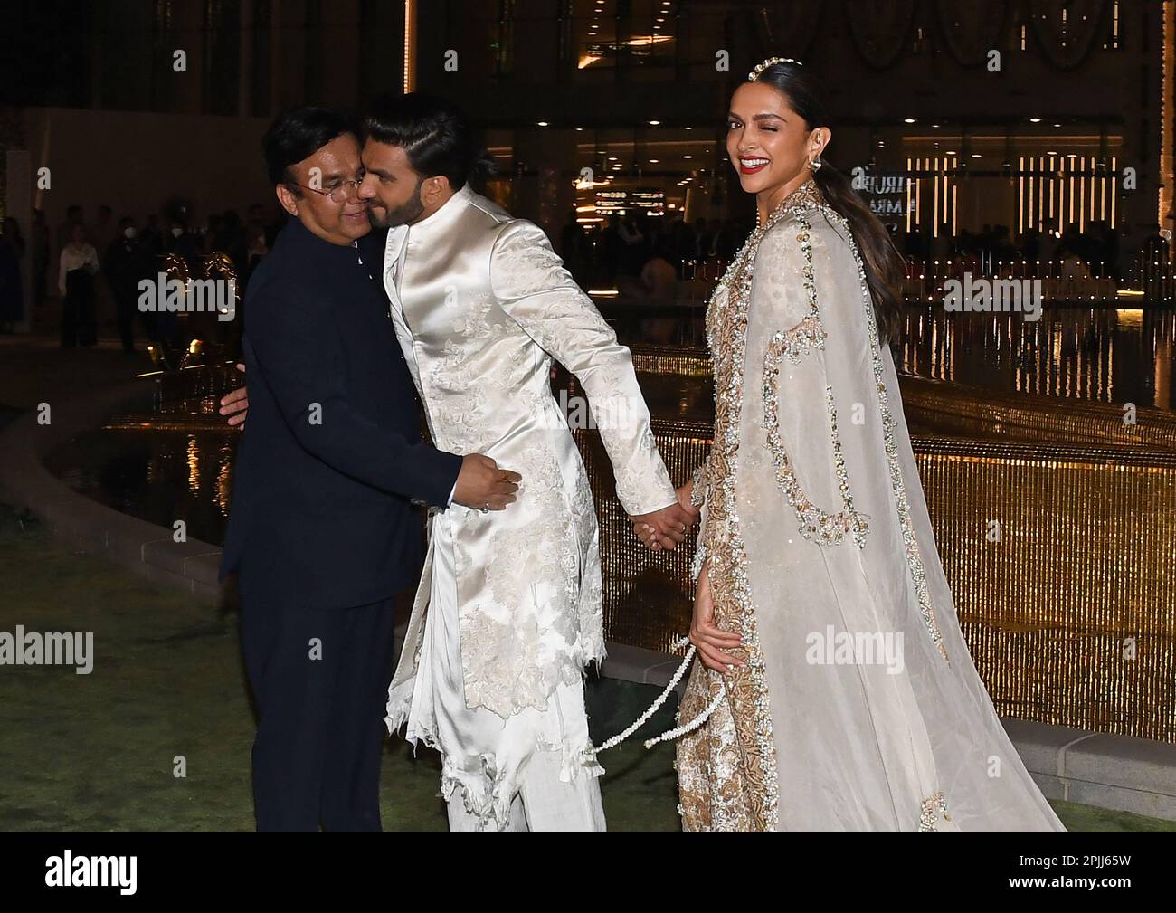 Mumbai, India. 31st Mar, 2023. Bollywood actor Ranveer Singh (c) and actress wife deepika Padukone seen at the inauguration of Nita Mukesh Ambani Cultural Centre (NMACC) in Mumbai. Credit: SOPA Images Limited/Alamy Live News Stock Photo