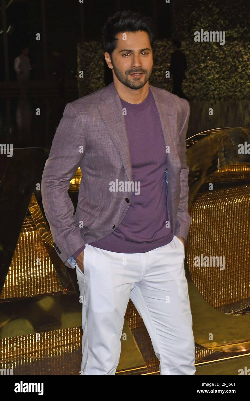 Mumbai, India. 31st Mar, 2023. Bollywood actor Varun Dhawan poses for a photo at the inauguration of Nita Mukesh Ambani Cultural Centre (NMACC) in Mumbai. Credit: SOPA Images Limited/Alamy Live News Stock Photo