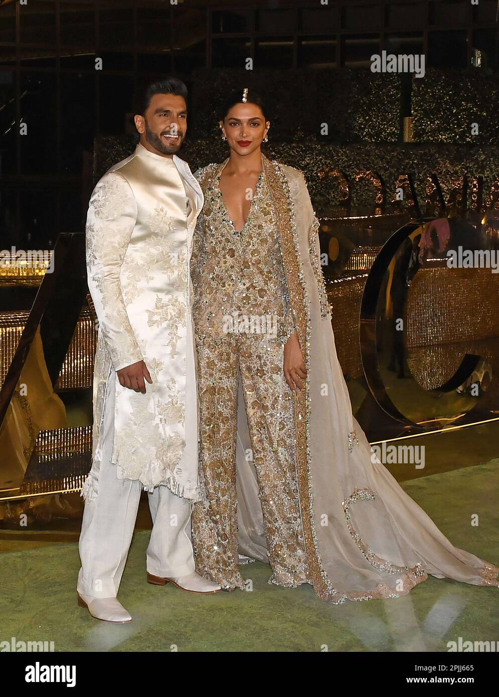 Mumbai, India. 31st Mar, 2023. Bollywood actors Ranveer Singh and Deepika Padukone pose for a photo at the inauguration of Nita Mukesh Ambani Cultural Centre (NMACC) in Mumbai. Credit: SOPA Images Limited/Alamy Live News Stock Photo