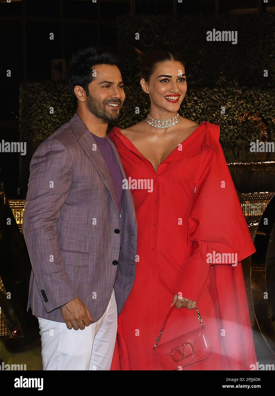 Mumbai, India. 31st Mar, 2023. L-R Bollywood actors Varun Dhawan and Kriti Sanon pose for a photo at the inauguration of Nita Mukesh Ambani Cultural Centre (NMACC) in Mumbai. (Photo by Ashish Vaishnav/SOPA Images/Sipa USA) Credit: Sipa USA/Alamy Live News Stock Photo