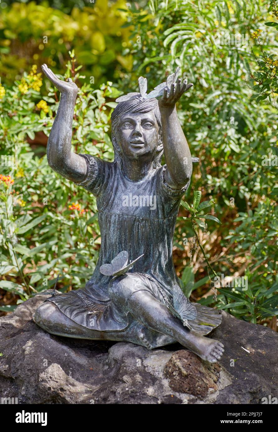 Honolulu,Oahu, Hawaii, USA, February 9, 2023 Bronze Statue of a Girl