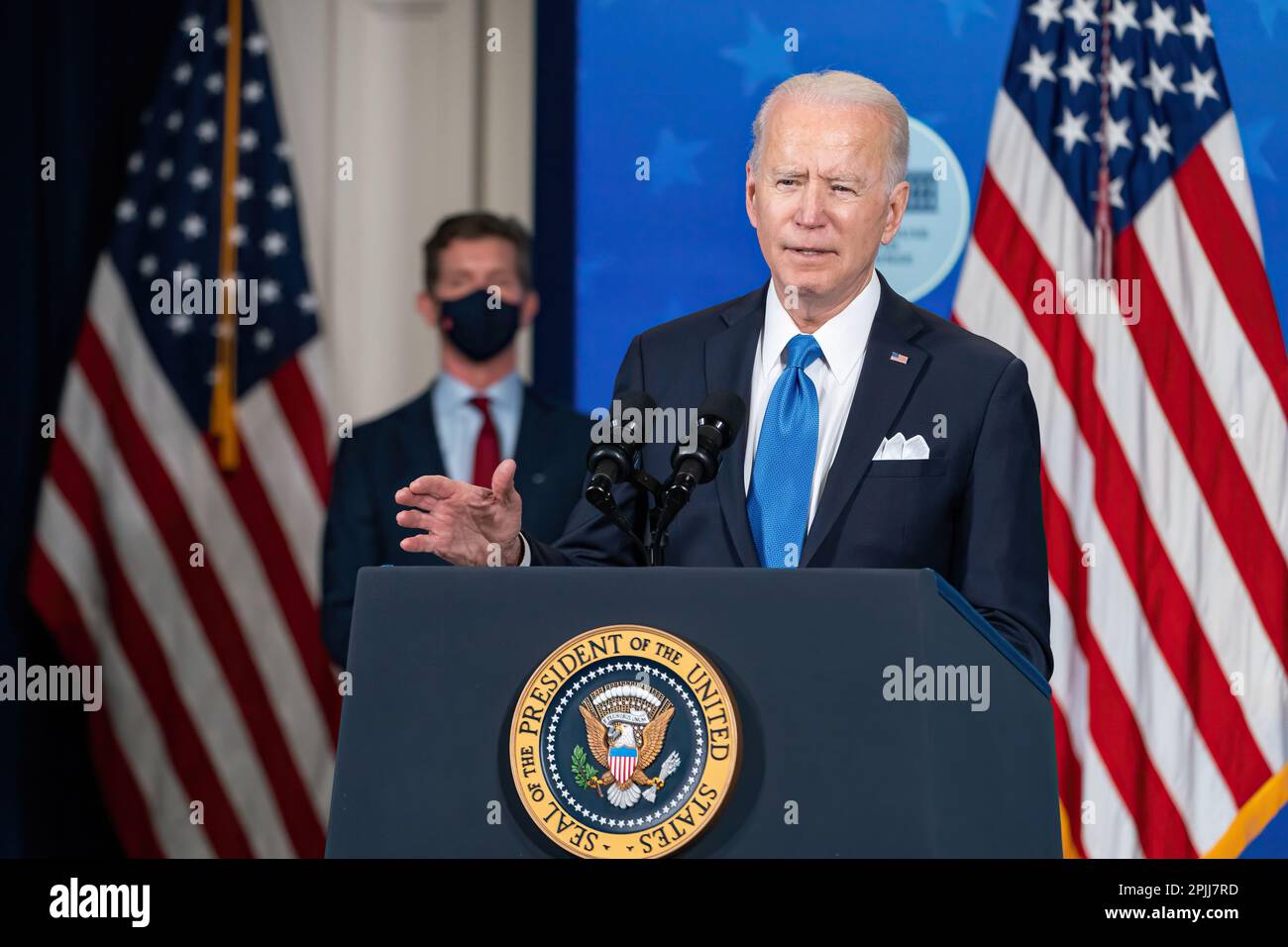 Johnson & Johnson CEO Alex Gorsky looks on as President Joe Biden delivers remarks on COVID-19 vaccine production Wednesday, March 10, 2021, in the South Court Auditorium in the Eisenhower Executive Office Building at the White House. (Official White House Photo by Adam Schultz) Stock Photo