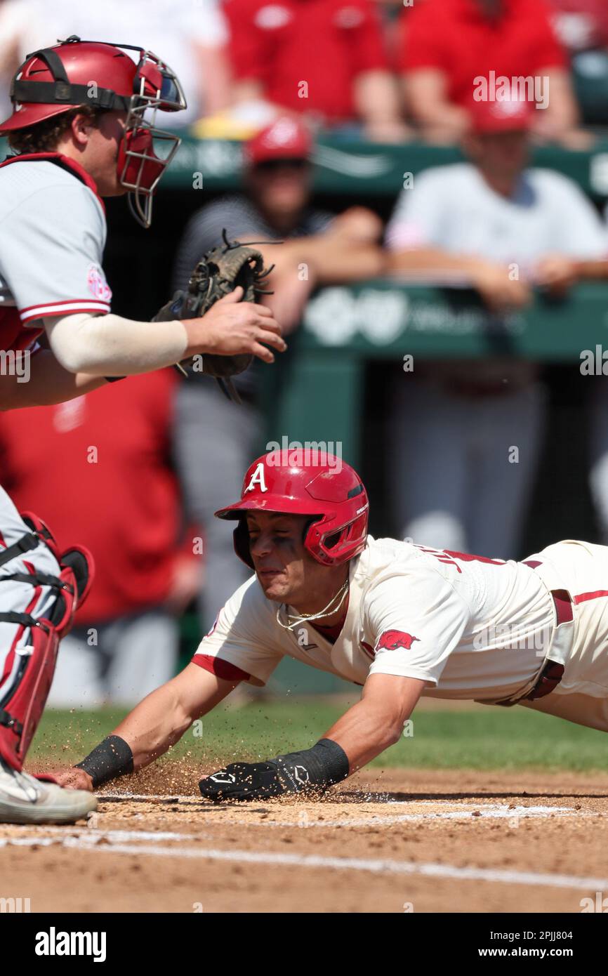 Defeated Razorback April 2, 2023: Razorback base runner Tavian Josenberger #12 slides ...