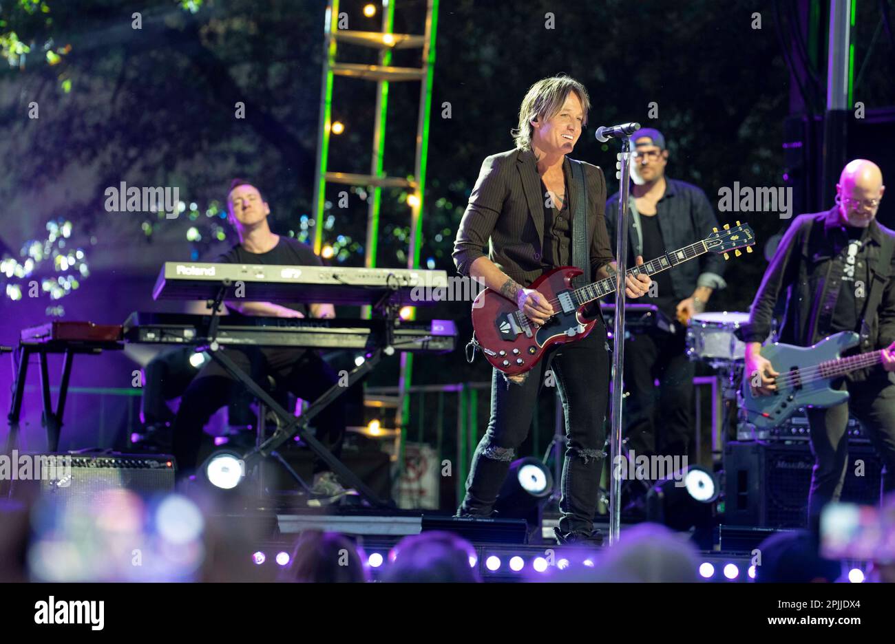 Austin, TX, USA. 29th Mar, 2023. Four-time Grammy award winning country singer KEITH URBAN performs onstage during a Country Music Television (CMT) Awards taping in downtown Austin, TX on March 29, 2023. A crowd of 3,000 music fans packed Congress Avenue to hear Urban, an Australian native, and other CMT country music stars in the shadow of the Texas Capitol. (Credit Image: © Bob Daemmrich/ZUMA Press Wire) EDITORIAL USAGE ONLY! Not for Commercial USAGE! Stock Photo