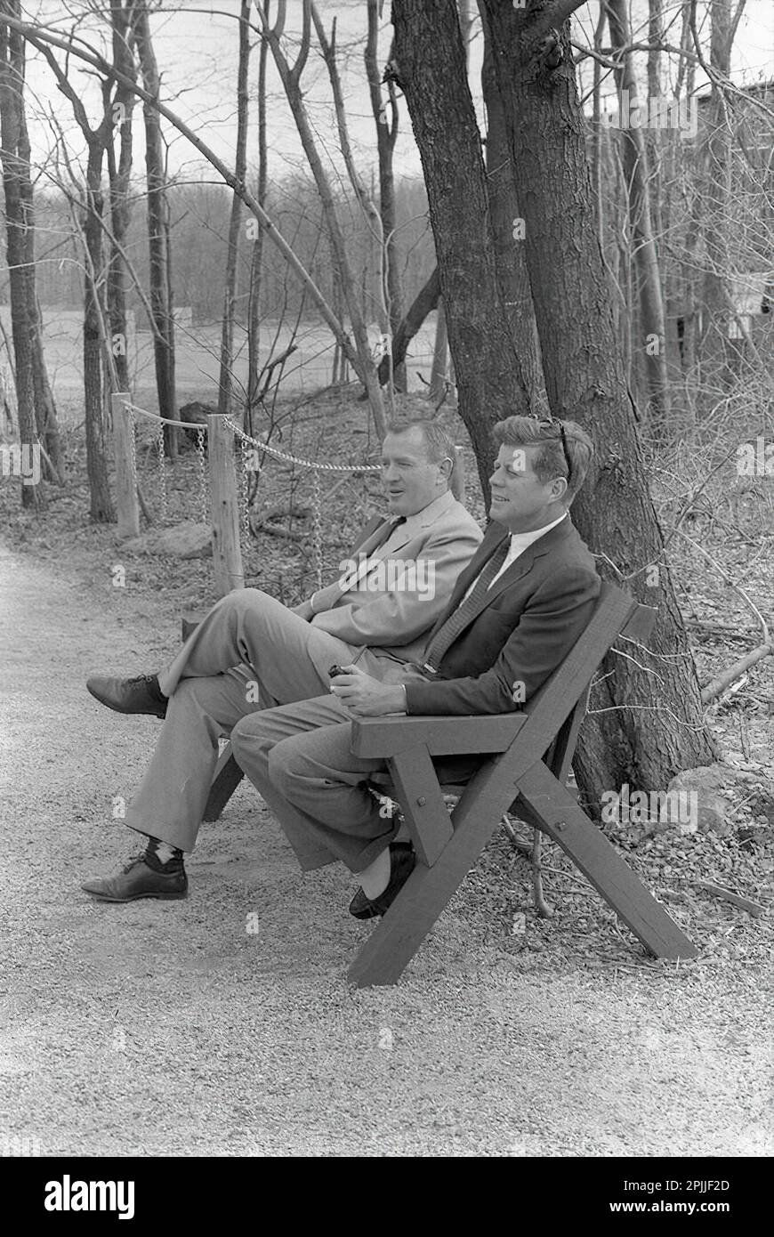 KN-27622                         31 March 1963 Weekend at Camp David. Under Sec. of Navy Paul Fay and JFK.   Please credit "Robert Knudsen. White House Photographs. John F. Kennedy Presidential Library and Museum, Boston" Stock Photo