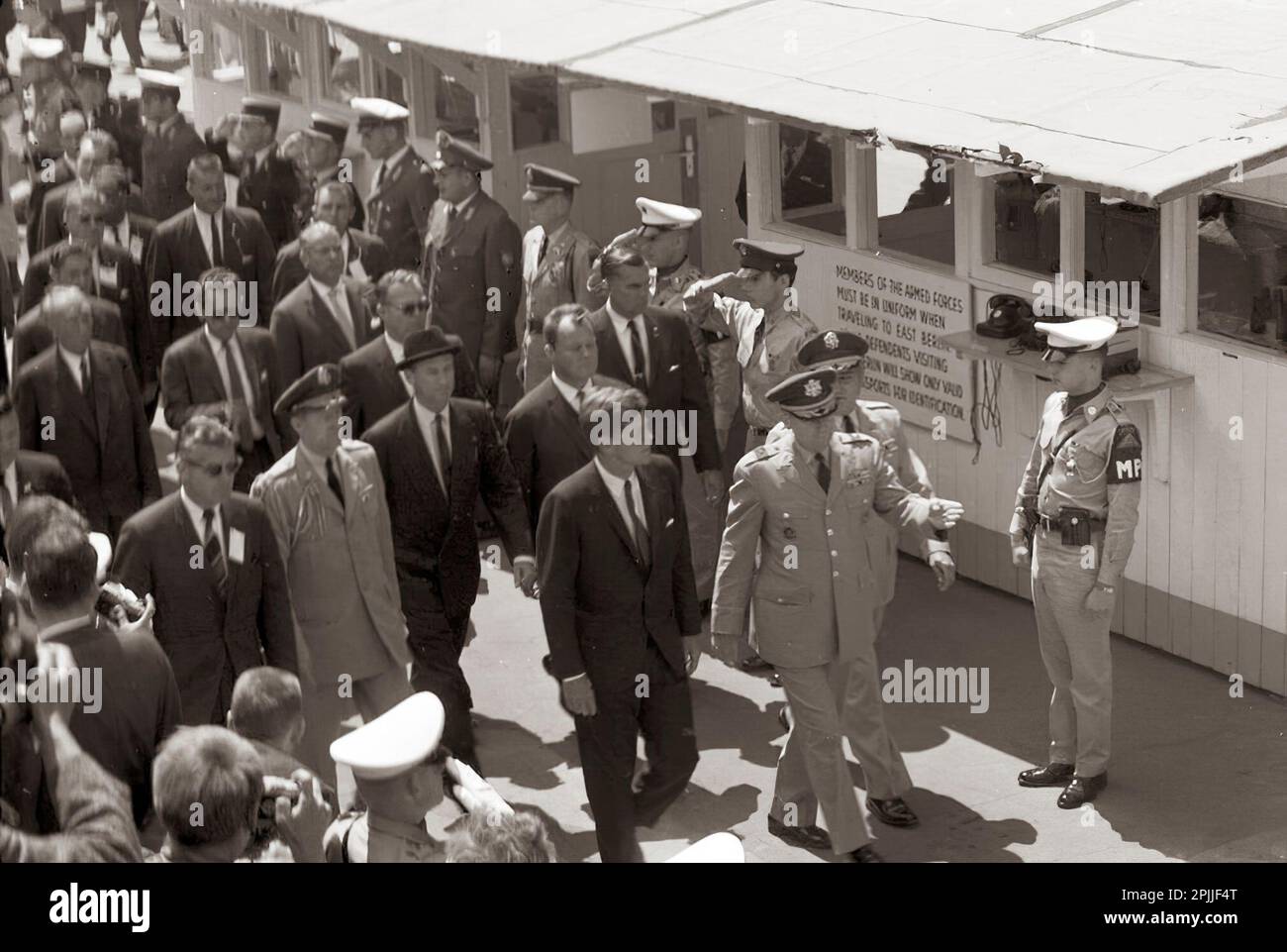 ST-C230-1-63        26 June 1963 Trip to Europe: Germany, West Berlin: President Kennedy at Checkpoint Charlie  Please credit "Cecil Stoughton. White House Photographs. John F. Kennedy Presidential Library and Museum, Boston" Stock Photo