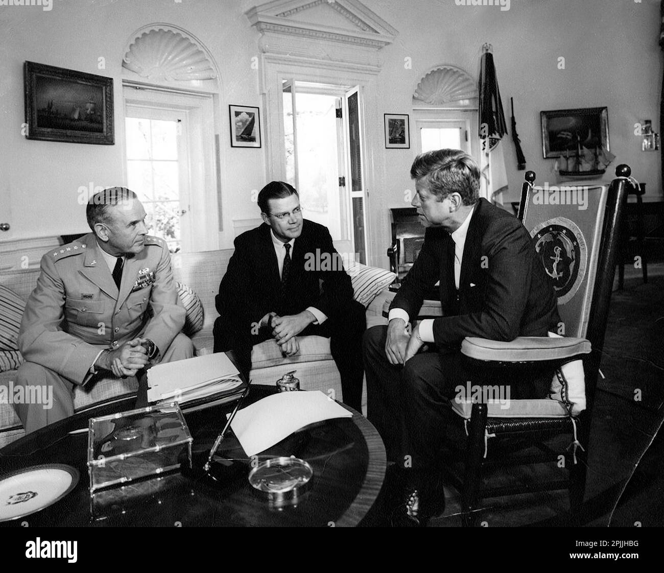 AR8153-A                       2 October 1963 Meeting with Secretary of Defense Robert S. McNamara, & Gen. Maxwell D. Taylor, Chairman, Joint Chiefs of Staff (JCS), 11:00AM  Please Credit 'Abbie Rowe. White House Photographs. John F. Kennedy Presidential Library and Museum, Boston' Stock Photo