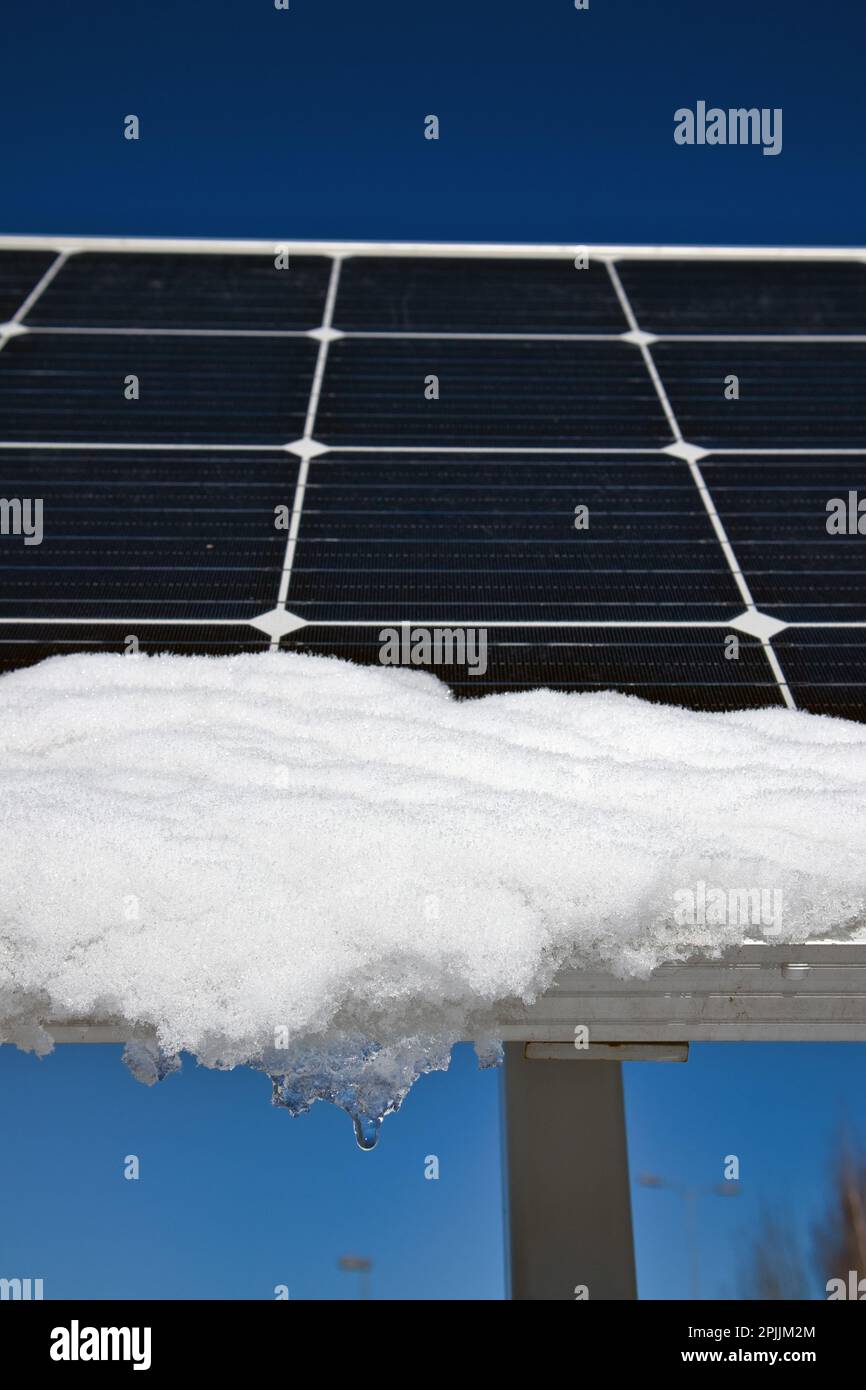 snow melting on solar panels in sunshine Stock Photo Alamy