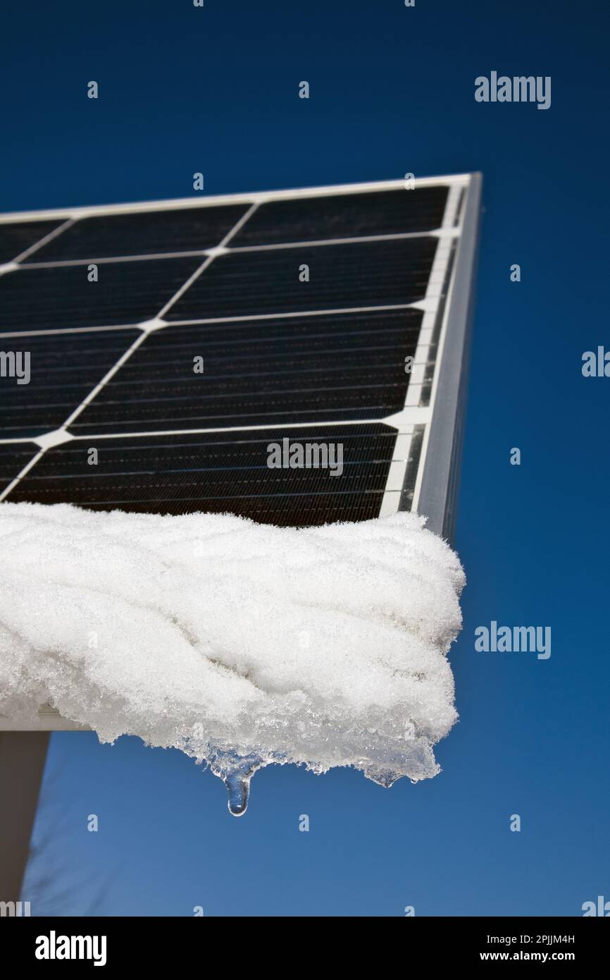 snow melting on solar panels in sunshine Stock Photo Alamy