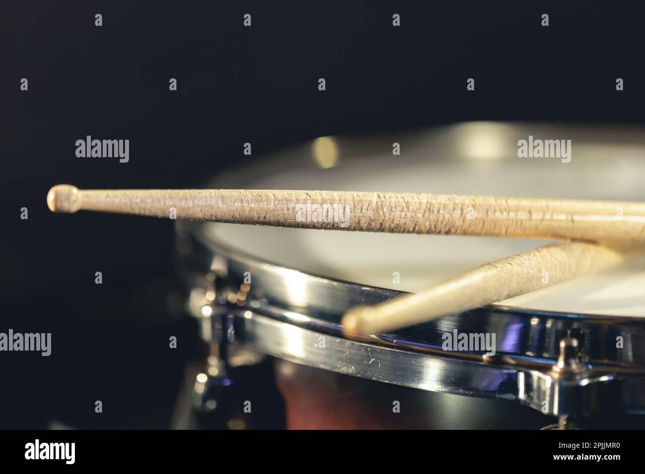 Close-up, snare drum and drumsticks on a dark background Stock Photo ...