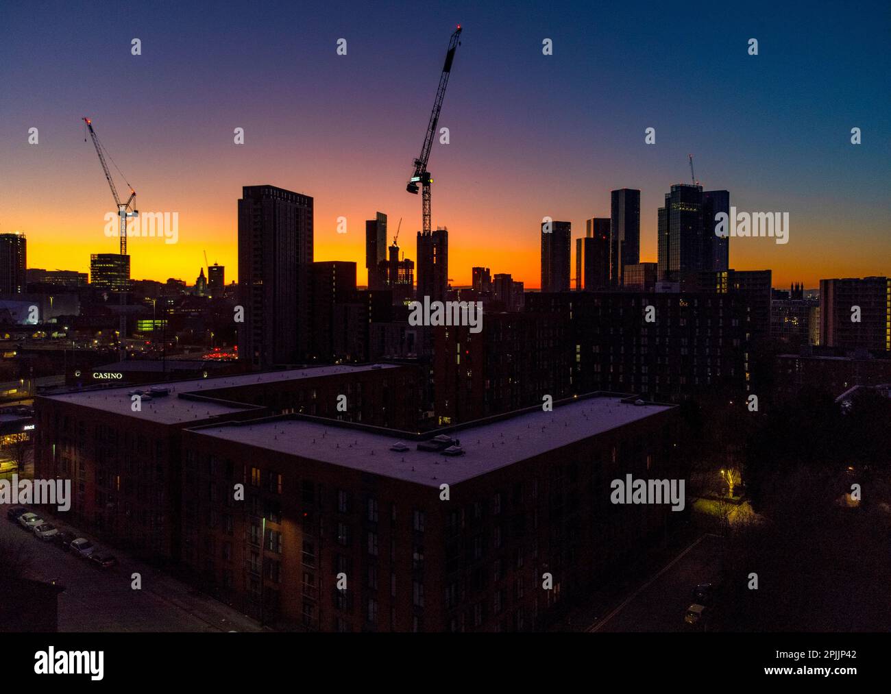 The sun rises over Manchester city centre. Picture date Monday April 3