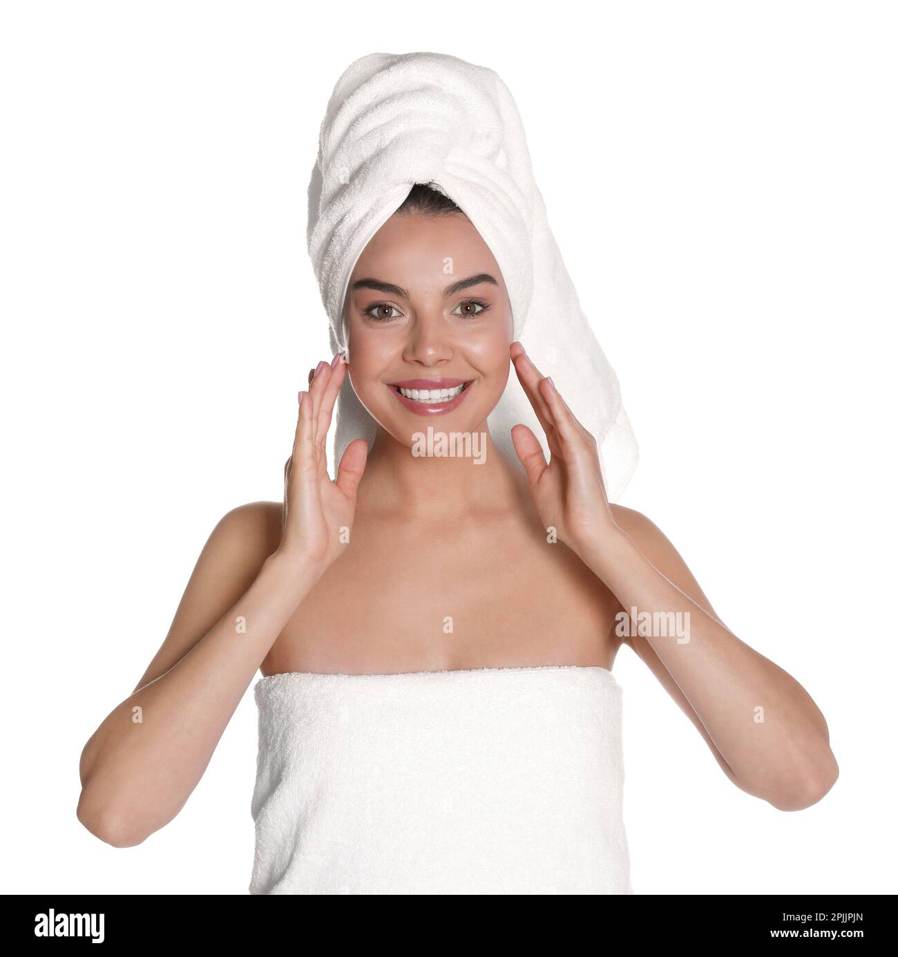 Beautiful young woman with towels on white background Stock Photo Alamy