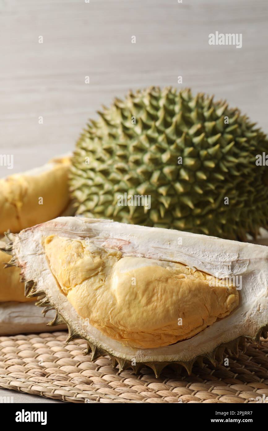 Fresh ripe durian fruits on wicker mat Stock Photo - Alamy