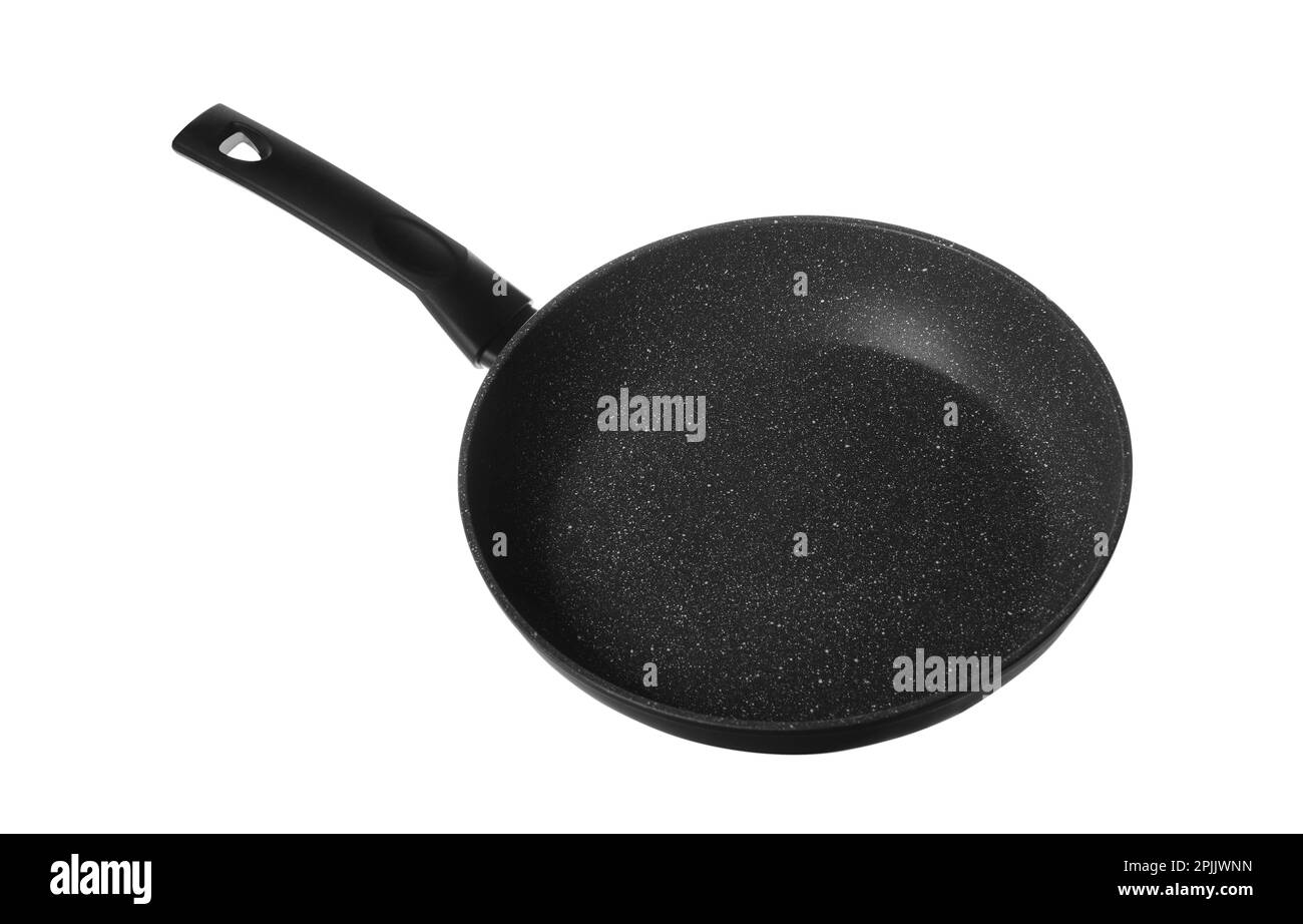 frying pan of pink color with white non-stick coating on an isolated  background Stock Photo - Alamy