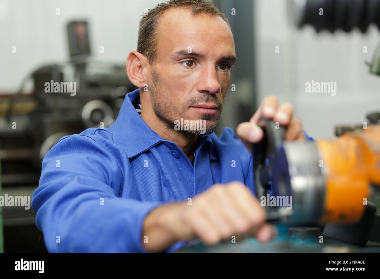 portrait of mechanic in overall at work Stock Photo Alamy
