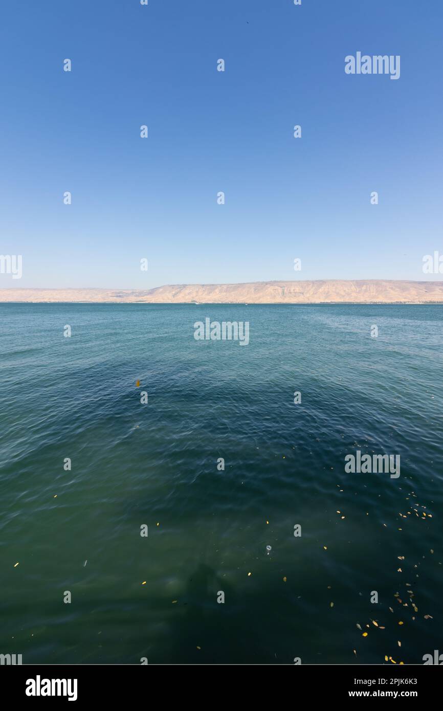 Sea of Galilee - clear and blue water against a clear summer sky ...