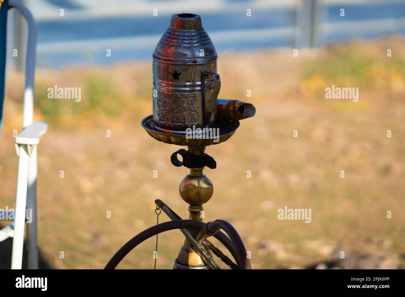 A real Syrian hookah on a beach in the Sea of Galilee Israel. Blurred