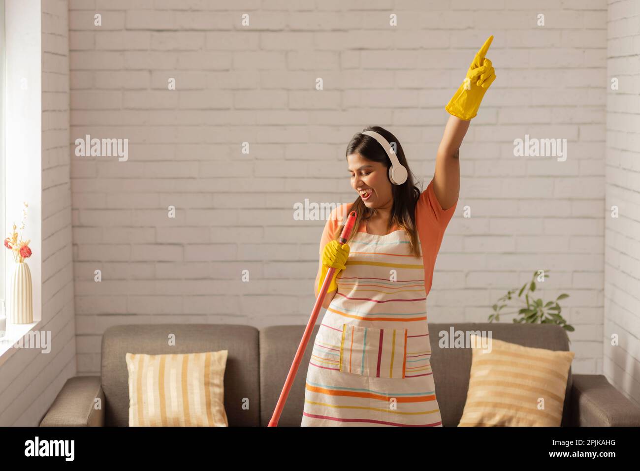 Sweeping floor with broom hires stock photography and images Alamy