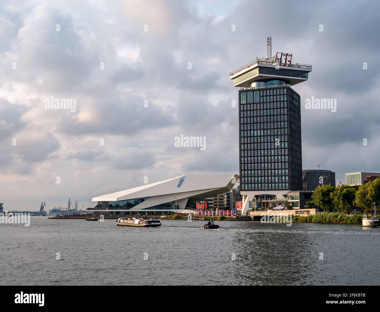Adam Tower, Eye Filmmuseum and boats on River IJ in Amsterdam, Netherlands Stock Photo