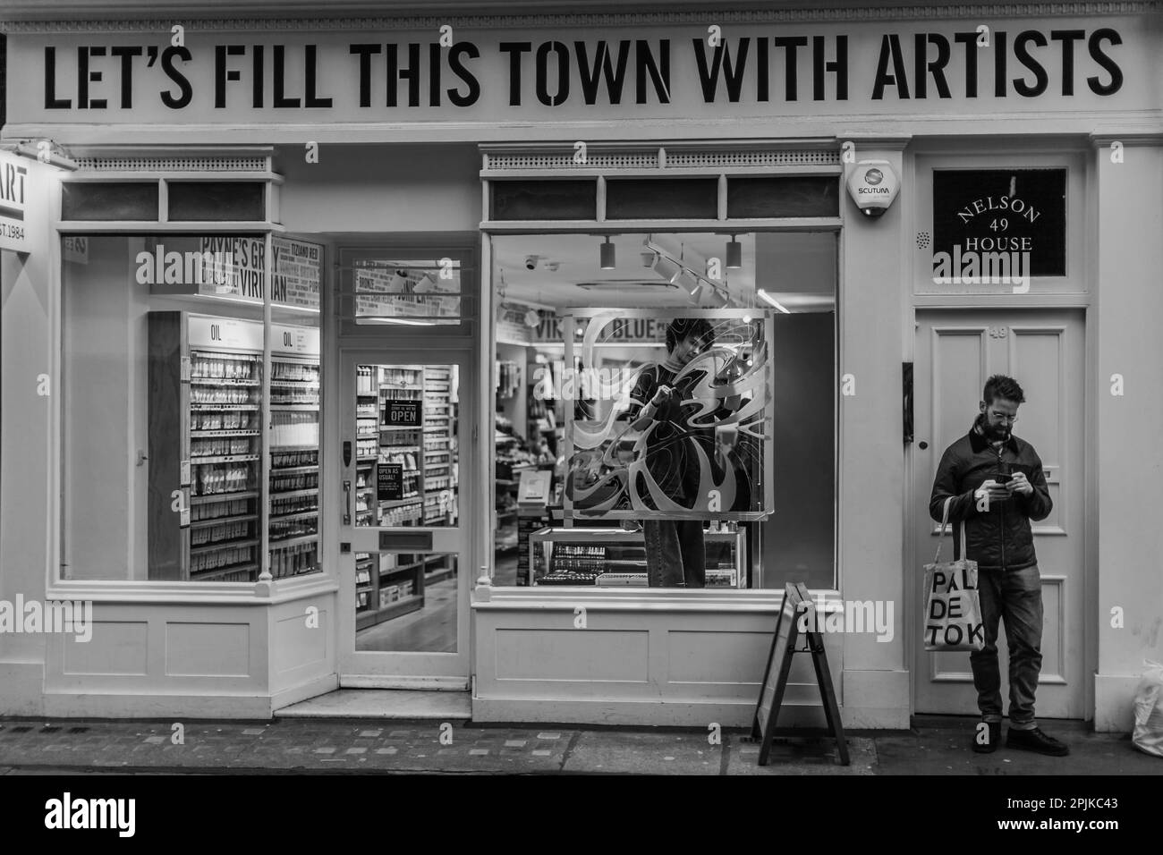 Let's Fill This Town With Artists store in London. Stock Photo