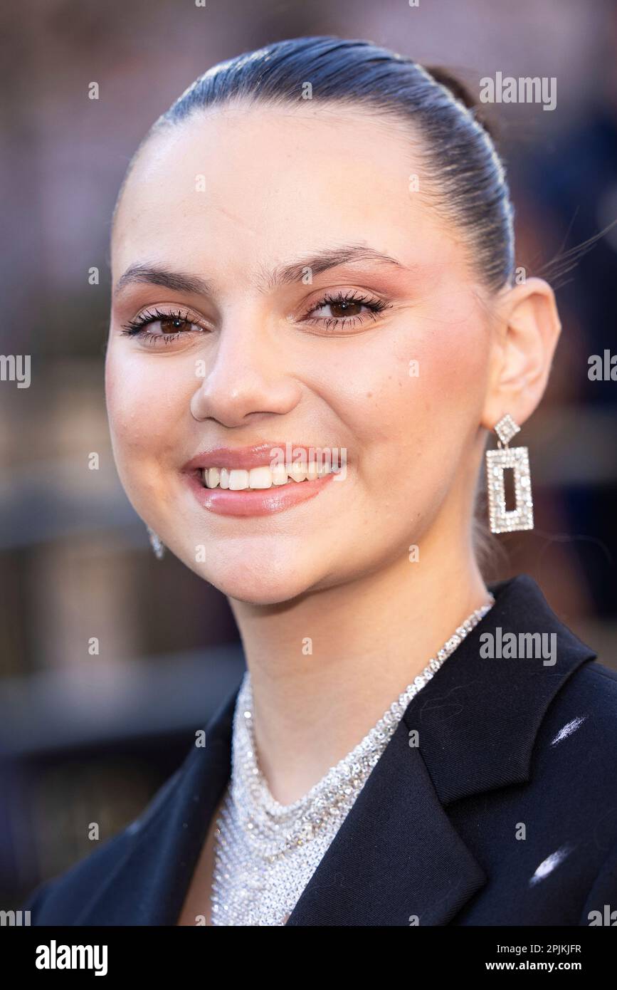 Dafne Keen poses for photographers upon arrival at the Olivier Awards