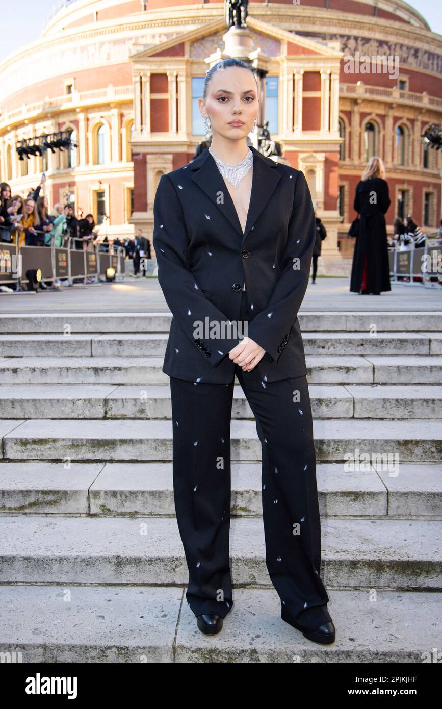 Dafne Keen poses for photographers upon arrival at the Olivier Awards