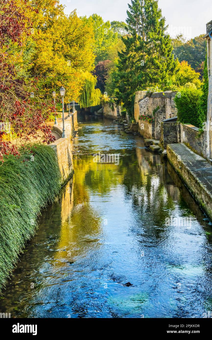 Colorful old buildings, Aure River reflection, Bayeux, Normandy, France