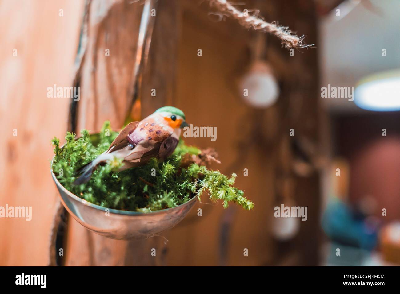 Close up of beautiful easter willow branches with hanging easter colorful eggs. Stock Photo