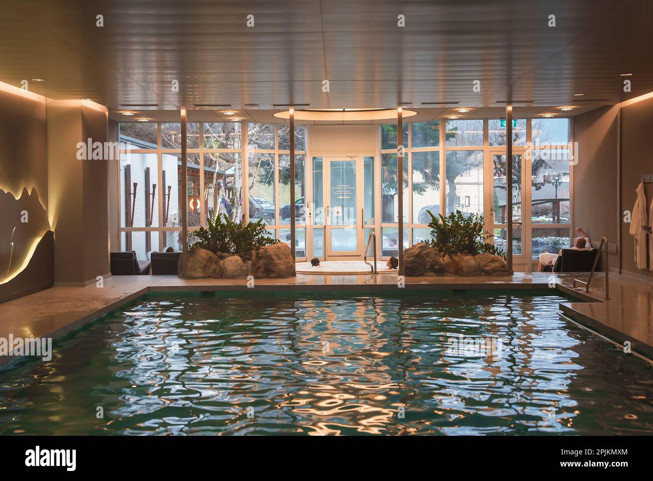 Interior of luxury hotel with swimming pool and plants Stock Photo - Alamy