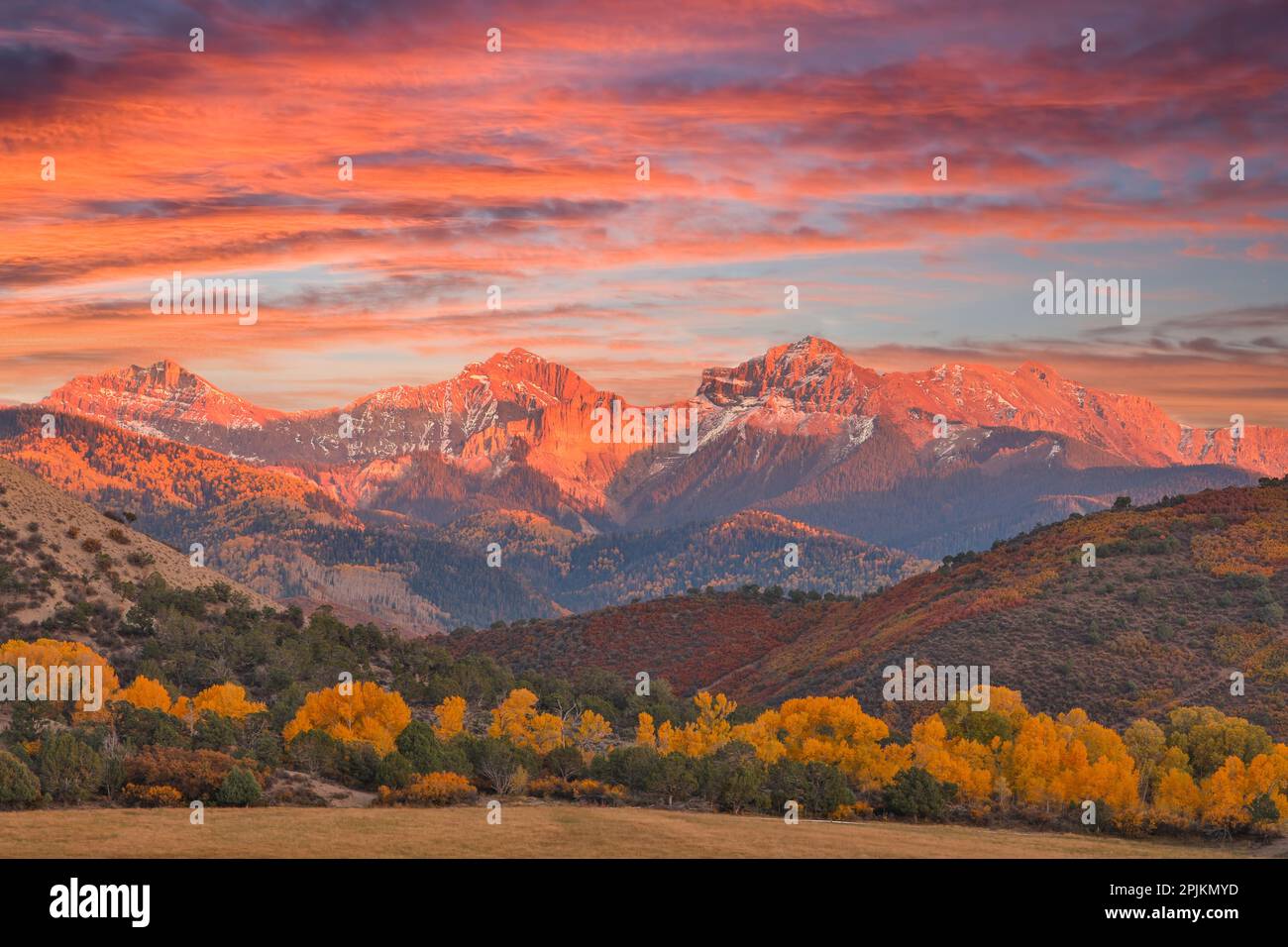 USA, Colorado, Ridgway. Sunset and Dallas Mountain Range autumn Stock Photo