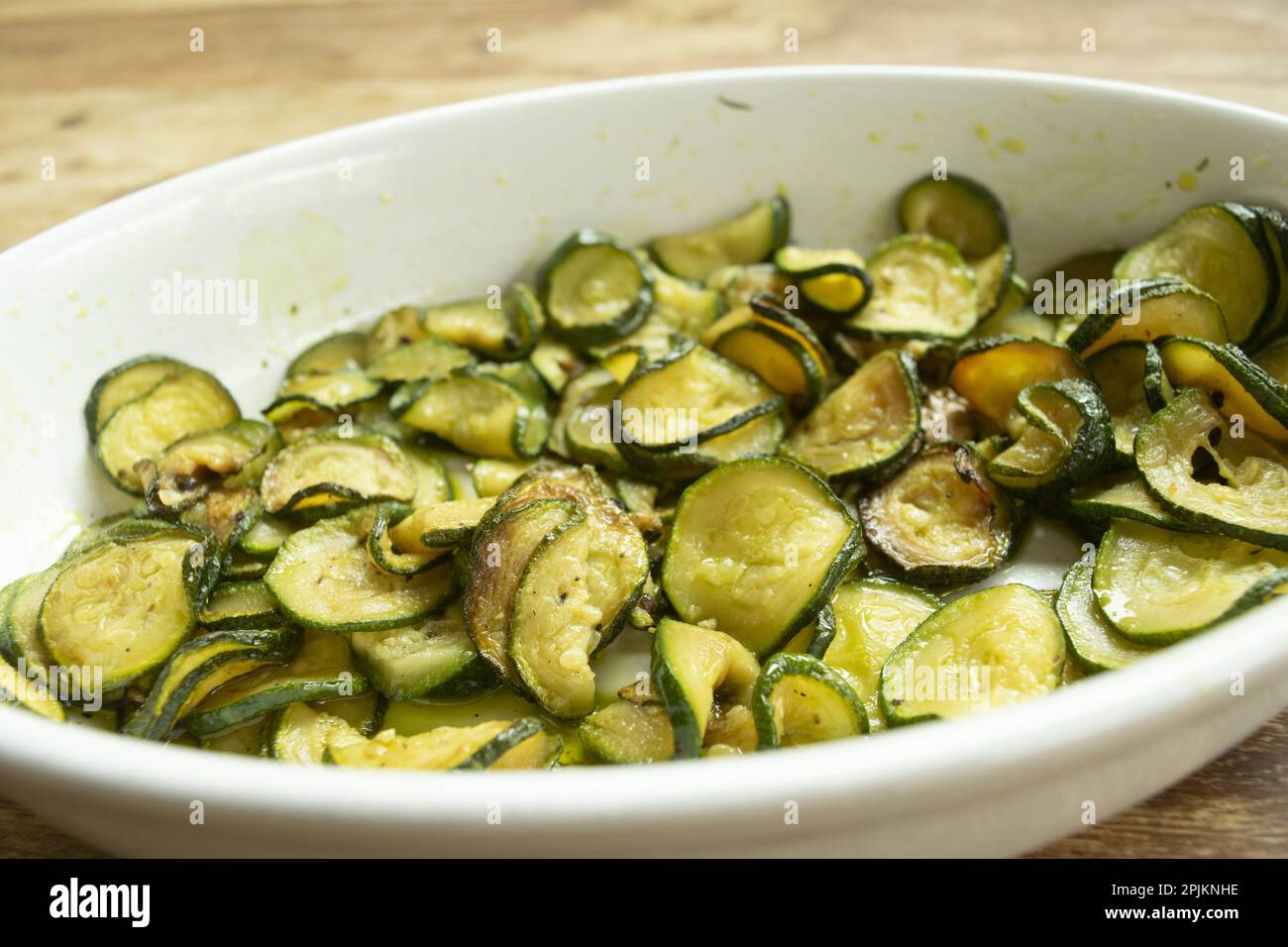 fried chips zucchini in a ceramic bowl Stock Photo