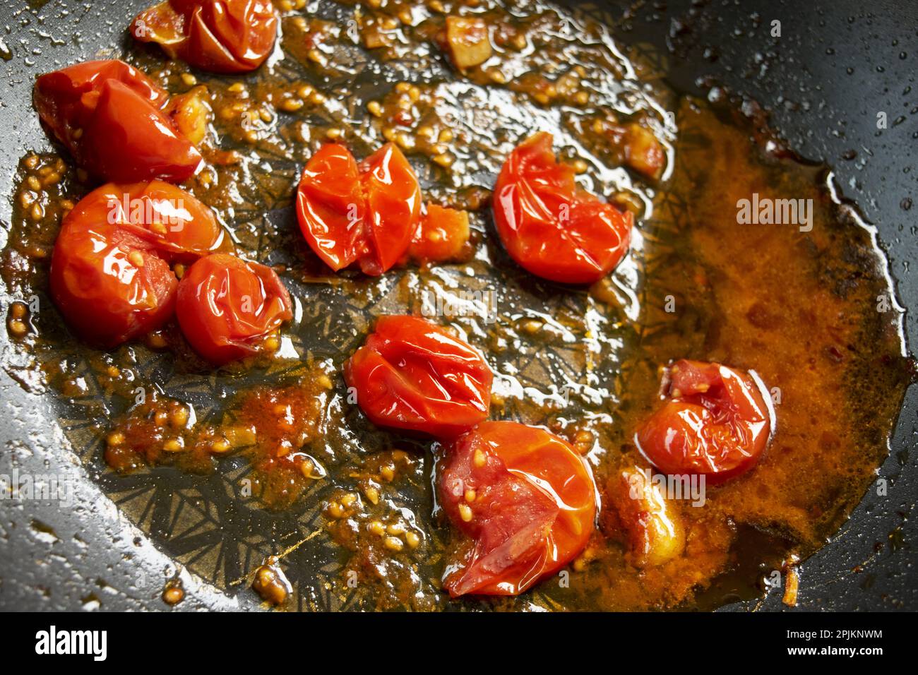 panfried tomato sauce made with cherry tomatoes Stock Photo Alamy