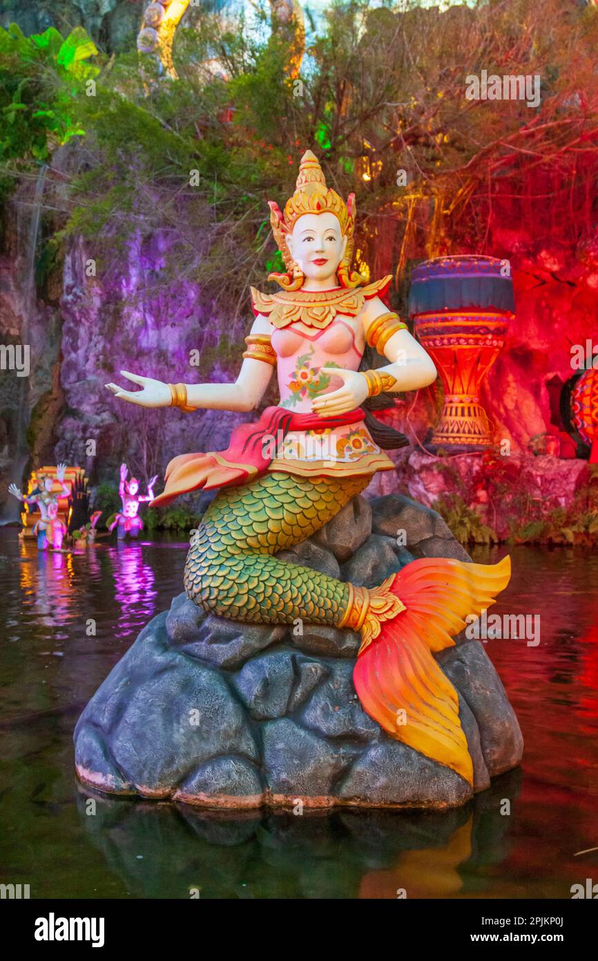 Thailand, Phuket. Statue of a mermaid in a pool at FantaSea park Stock Photo