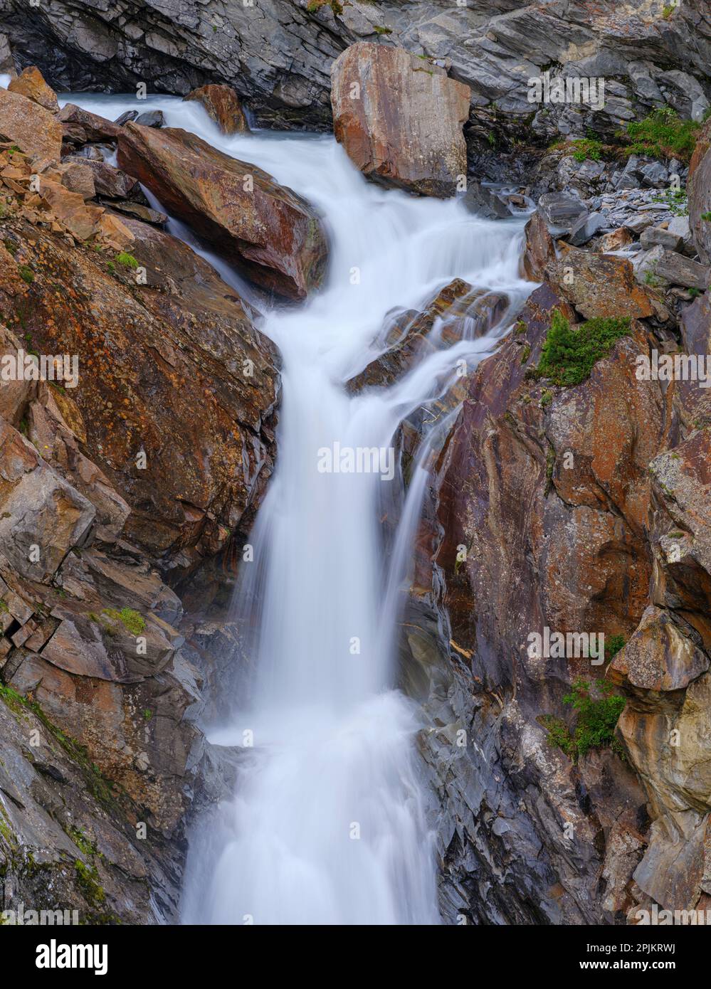 Waterfall Rotmooswasserfall in the Otztal Alps in the Naturepark Otztal. Europe, Austria, Tyrol Stock Photo