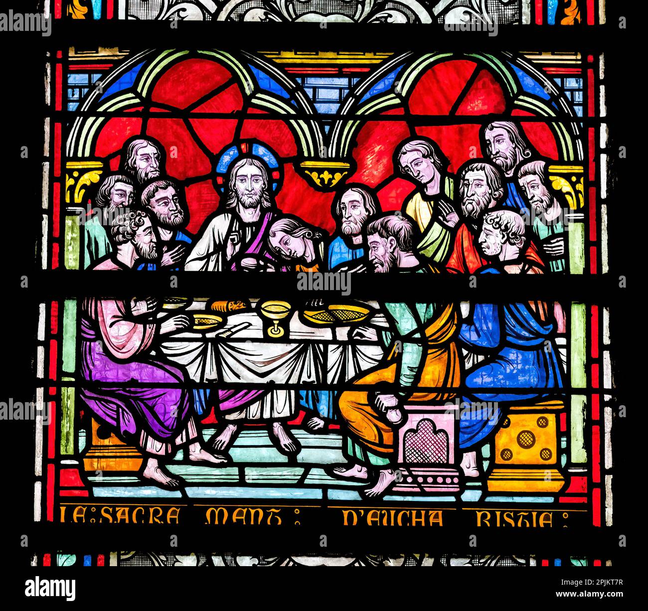 Jesus and disciples Last Supper, stained glass, Notre-Dame of the Assumption, Sainte-Marie-du-Mont, Normandy, France. 11th to 13th Century Stock Photo