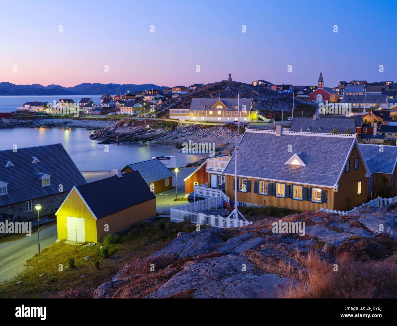 View over the old colonial harbor and the old town. Nuuk the capital of Greenland during late autumn. Greenland, Danish Territory Stock Photo