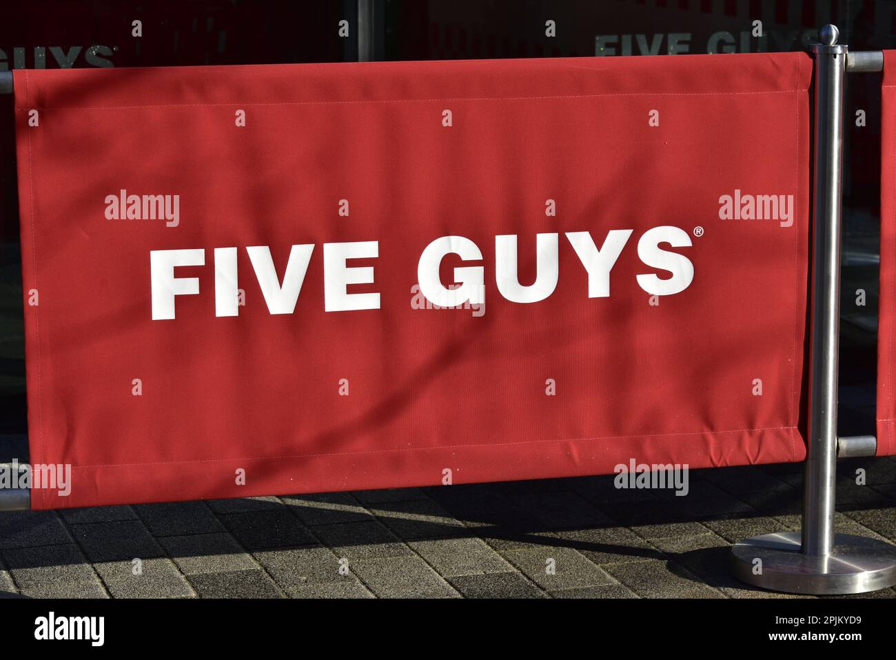 Sign outside a Five Guys fast food restaurant in Manchester, UK Stock