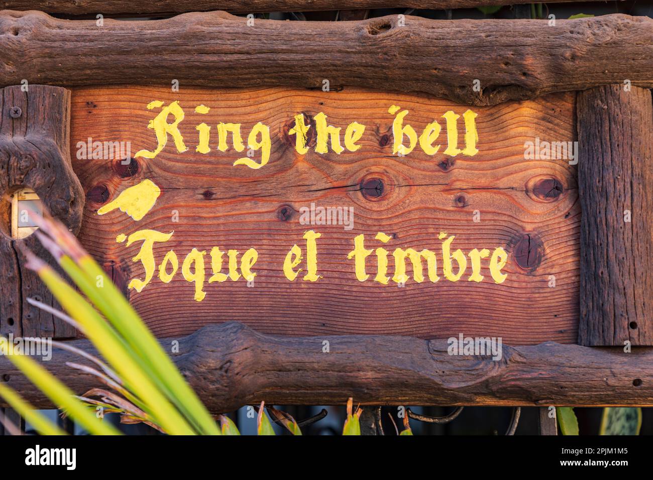 Loreto, Baja California Sur, Mexico. A sign saying 'Ring the bell' in