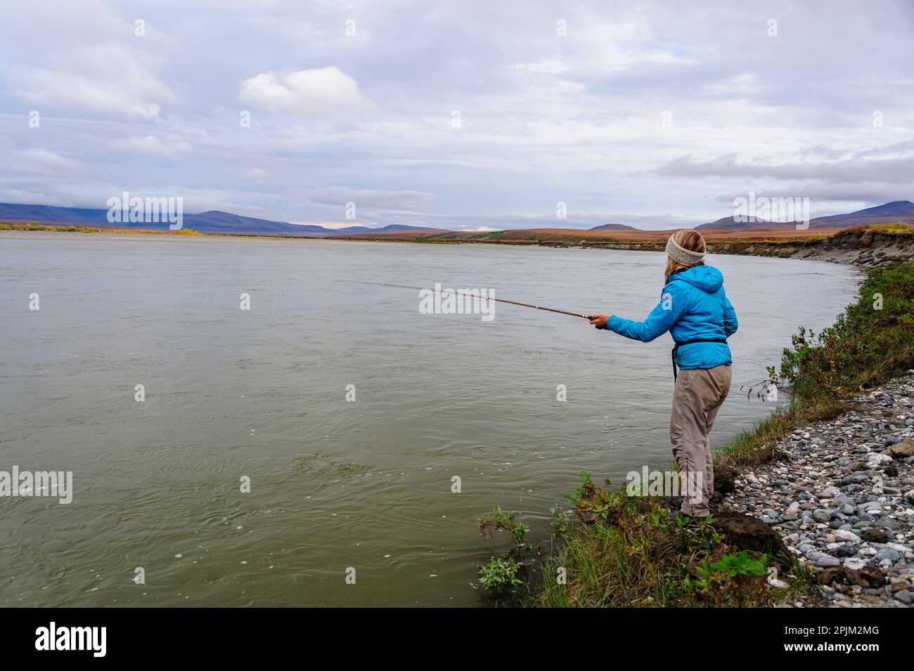 USA, Alaska, Noatak National Preserve. Fishing in the Noatak River. (MR