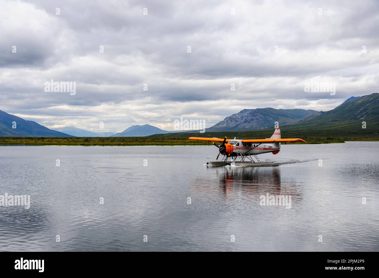 USA, Alaska, Kotzebue, Noatak River. Float plane on the Noatak River. (Editorial Use Only) Stock Photo