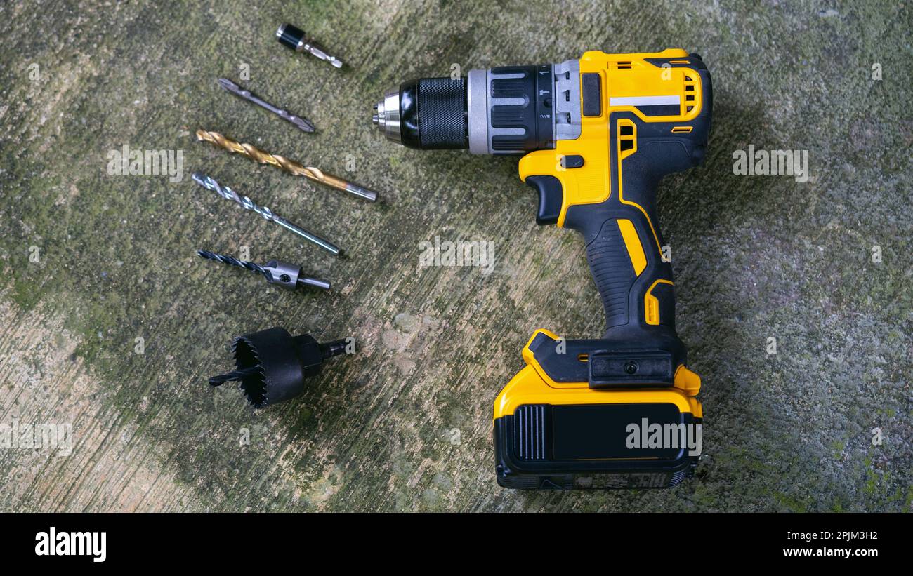 Power drill or Cordless screwdriver with battery. Stock Photo