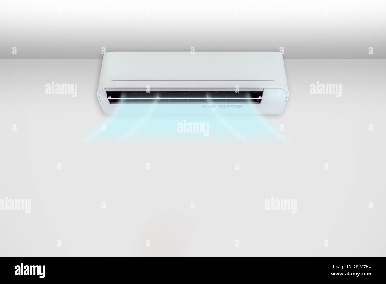 Man turning on the air conditioner Stock Photo Alamy