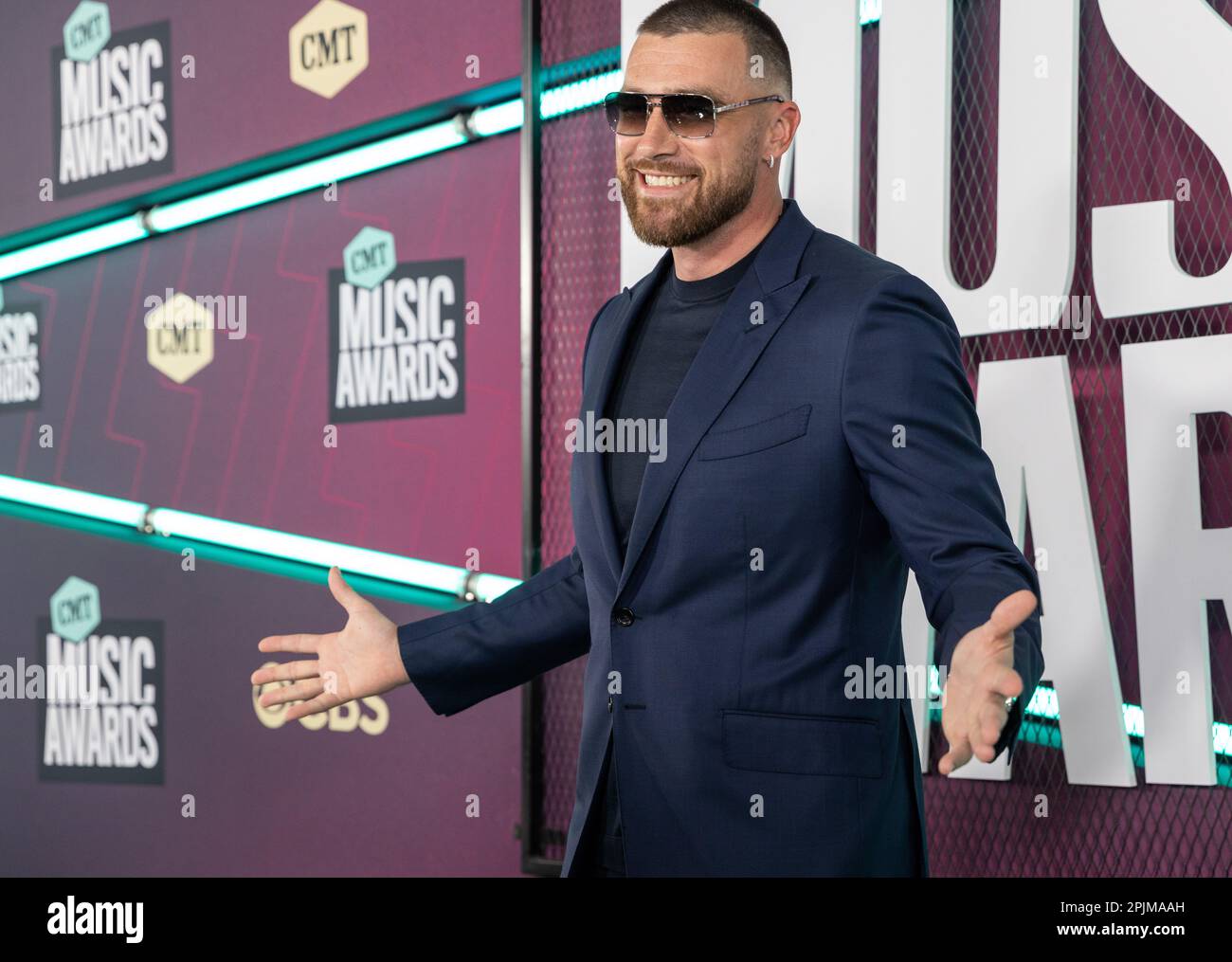 Austin, USA. 02nd Apr, 2025. Travis Kelce walks the red carpet at the