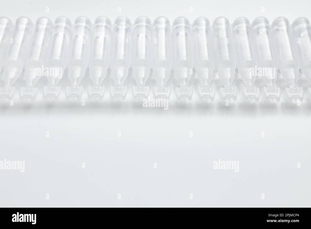Single dose ampoules of sterile isotonic sea water solution on white